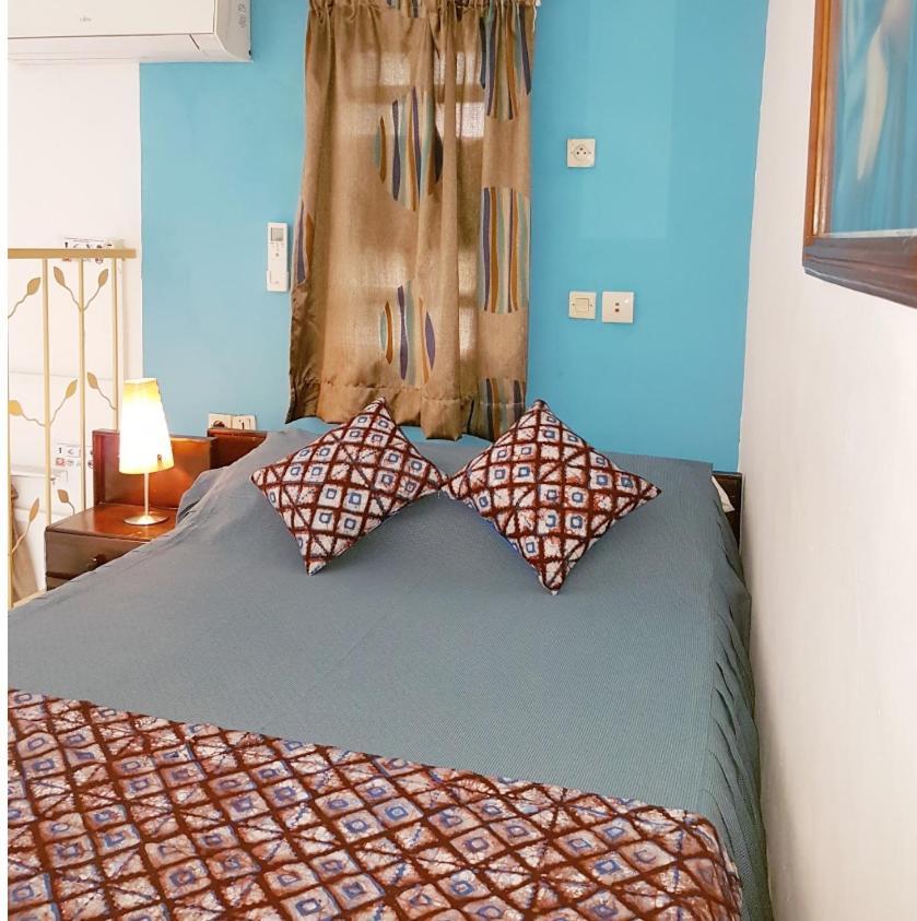 Residence Bertille Abidjan Cocody Exterior photo